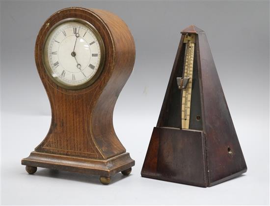 A balloon mantel clock and metronome Clock H.24cm